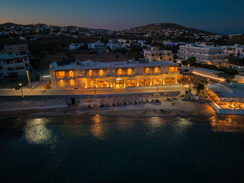 Aerial night view of Armia Experience Hotel beachfront, Vári, Sýros